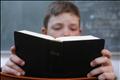 Child holding Bible